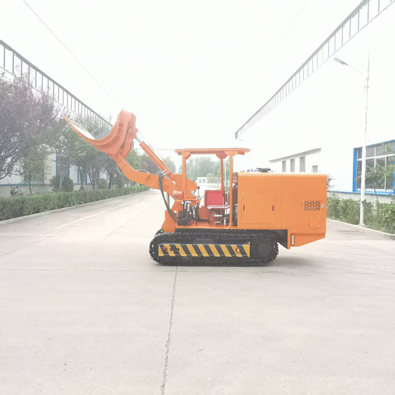 Chargeuse de roches à déchargement latéral de grande taille