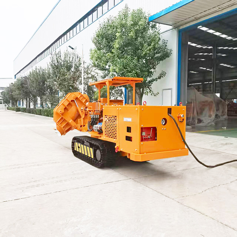 Máy xúc đá bánh xích