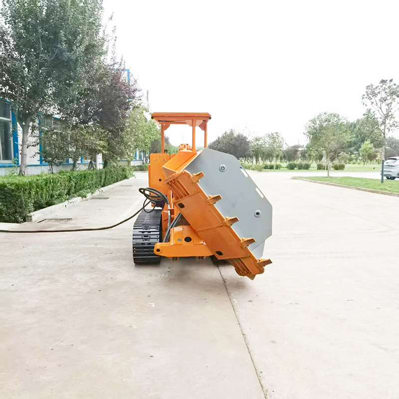 Chargeuse à roches à benne latérale chenillée