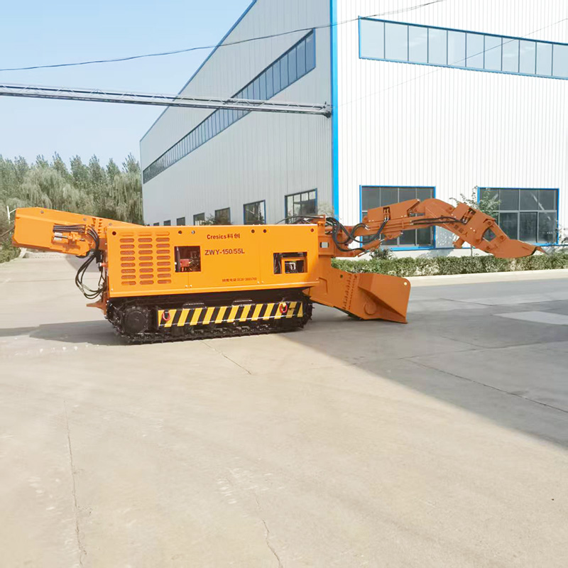 Гусеничный экскаватор-погрузчик