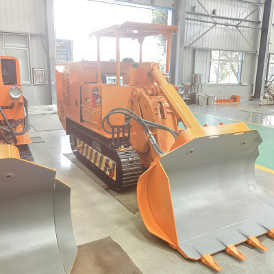 Cargadora de rocas de descarga lateral 60