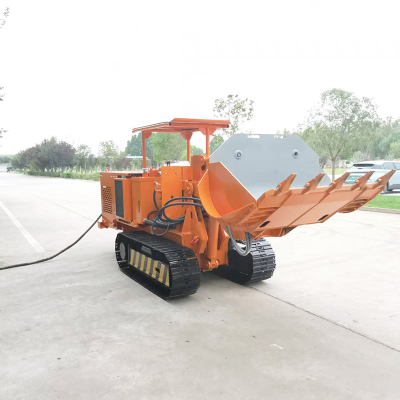 Chargeur de roches à déchargement latéral minier